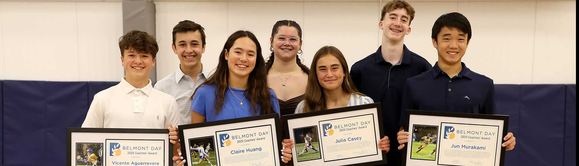 The 2025 Coaches Award winners pose with their awards